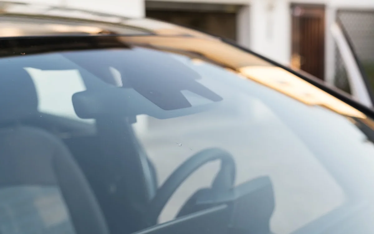 Windshield glass — genuine glass with the camera behind it recalibrated