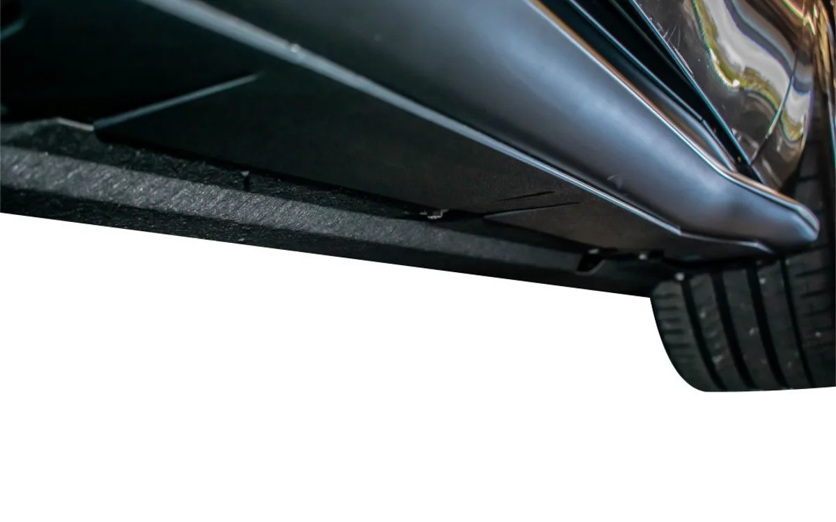 Rocker panel and side skirt — straightened, sealed and painted to the code