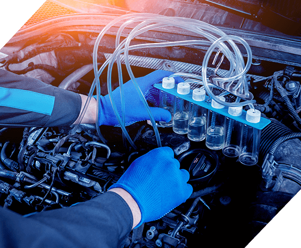 Cleaning engine injectors. Car repair. Service station.
